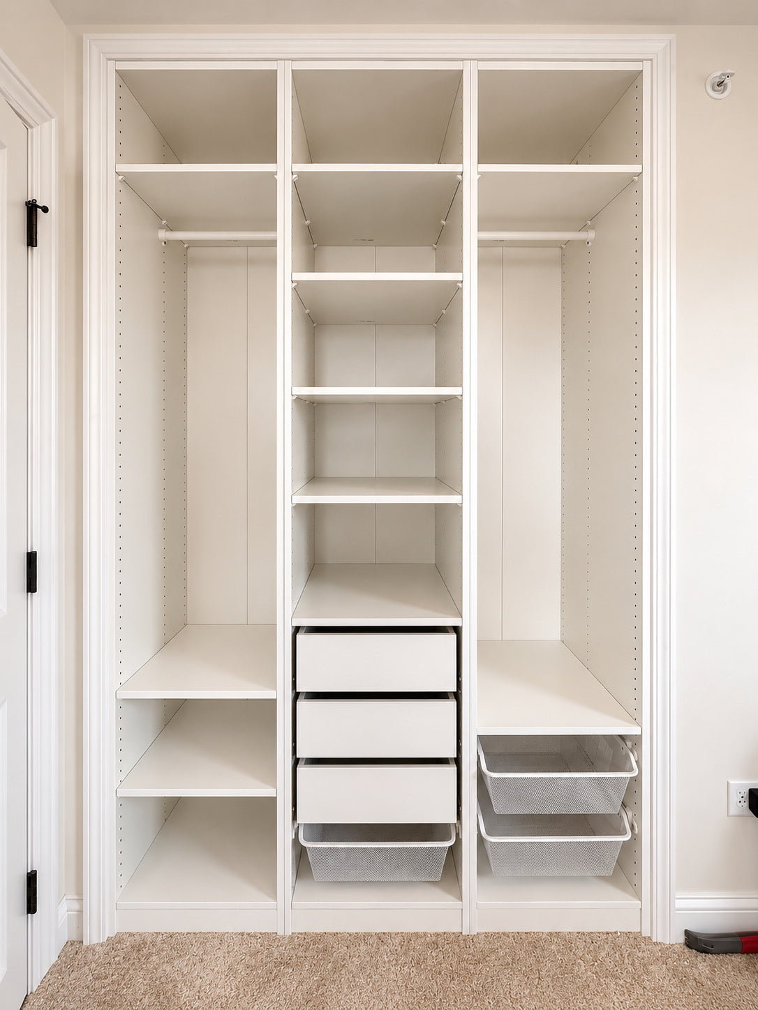 Real ModuCloset Project 4 — open interior organizer with shelves, three drawers, hanging rods and pull-out mesh baskets.
